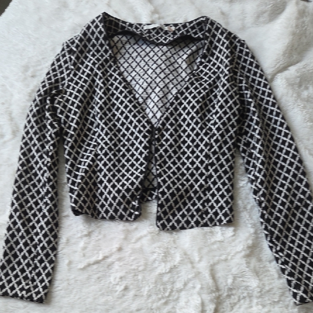 Have Black and White Diamond Pattern Top